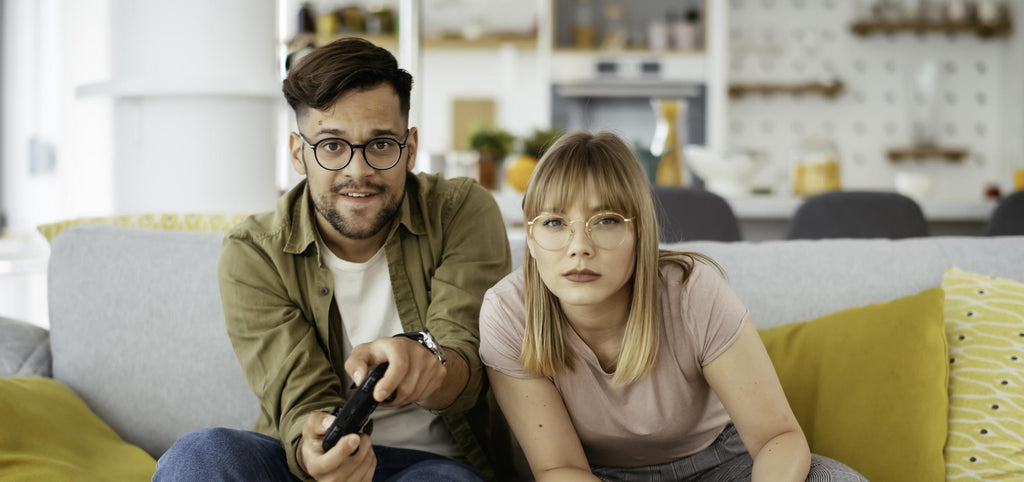 Gamer glasses couple playing games